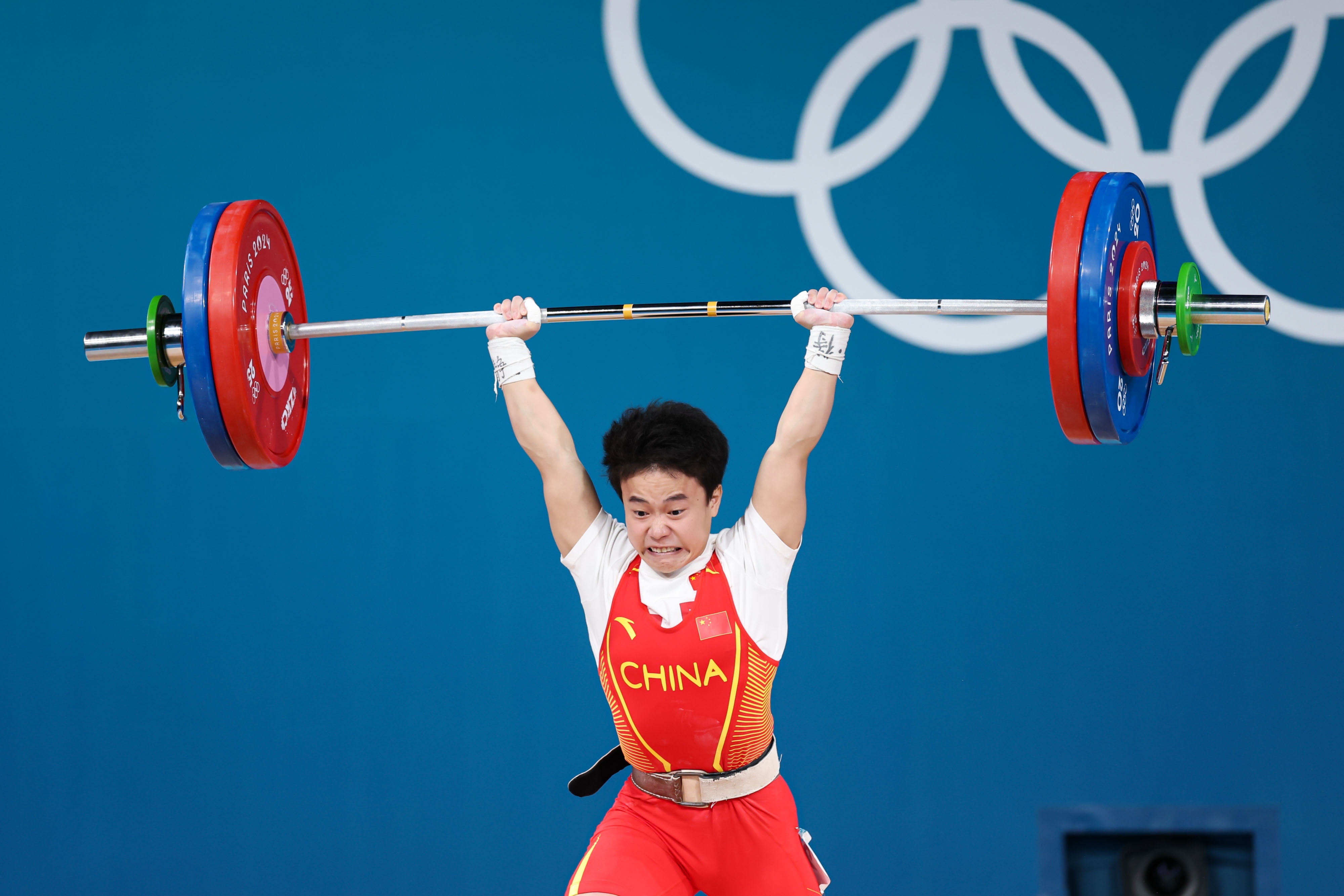 九游体育直播-中国队在举重比赛中创造新纪录